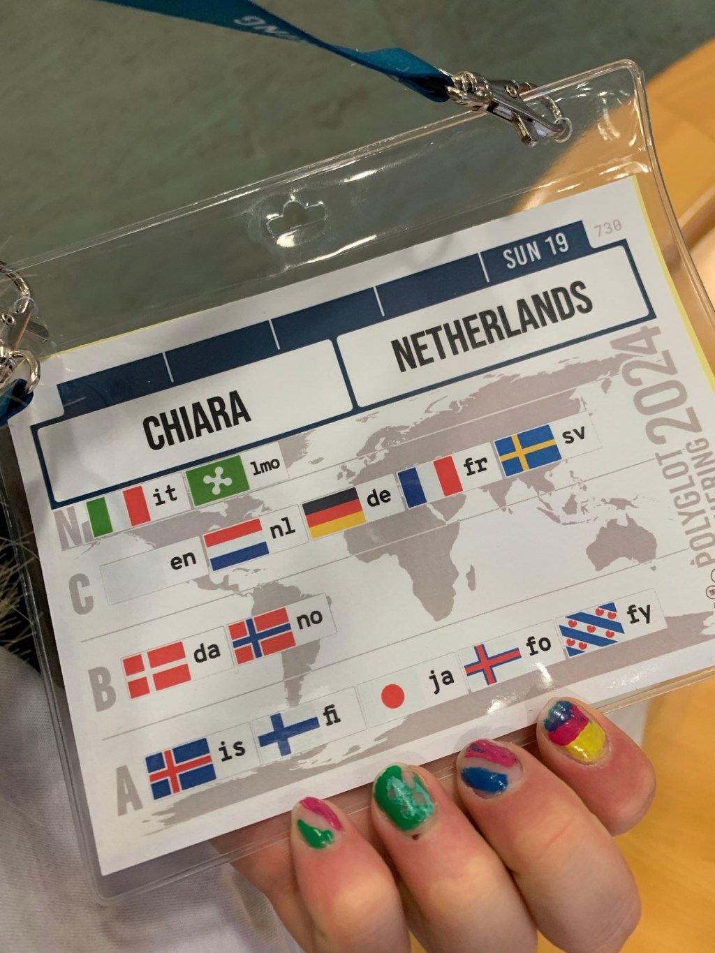 name tag polyglot gathering with languages you speak